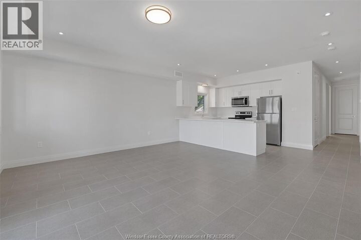 Property Photo:  233 Watson 306  ON N8S 3R8 