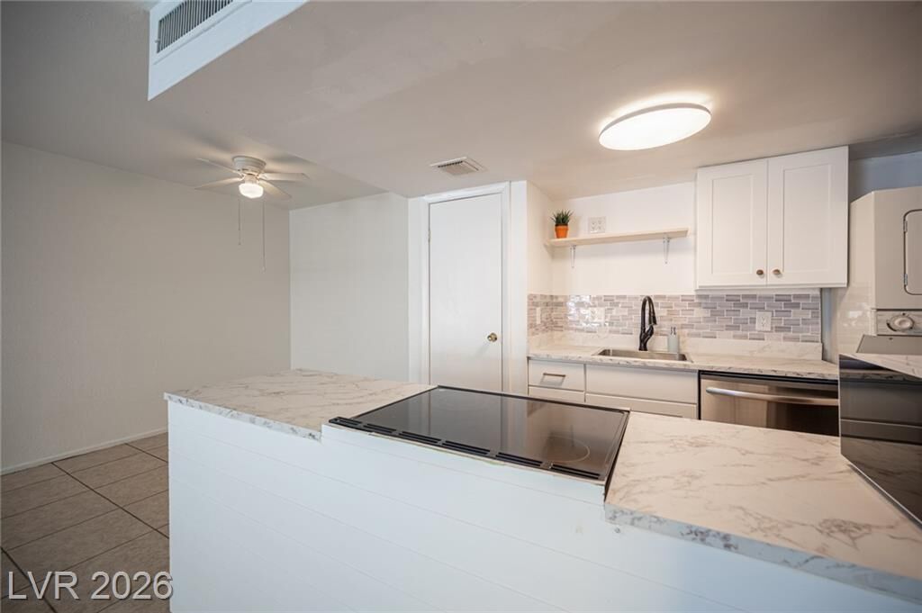 Property Photo: 1428 Lorilyn Avenue 3 NV 89119