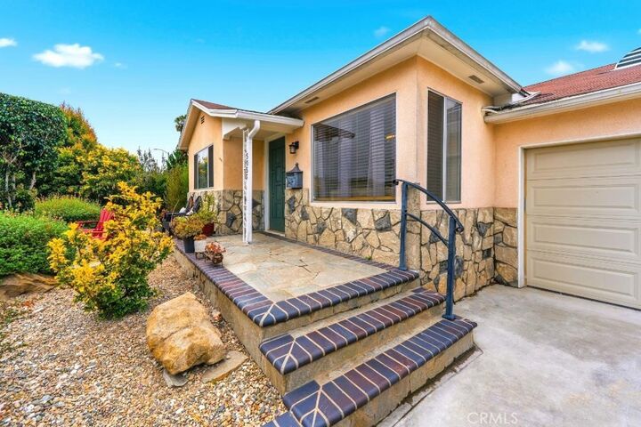 Property Photo:  5055 N Raton  CA 90807 