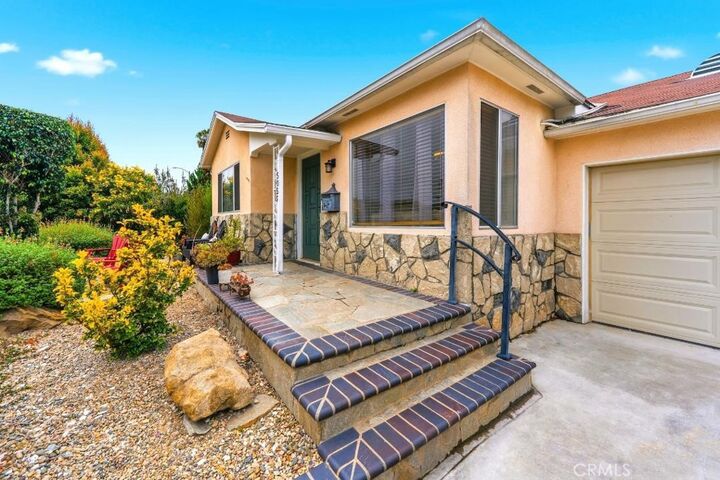Property Photo:  5055 N Raton  CA 90807 