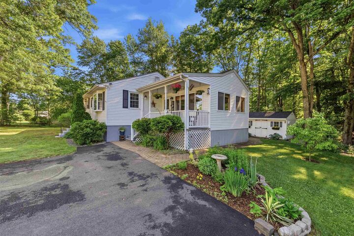 Property Photo: 85 Belmont Drive NH 03054