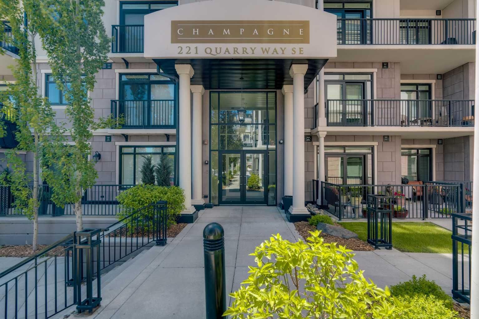Property Photo: 221 Quarry Way SE 104 AB T2C 5M7