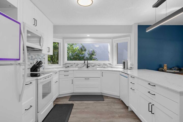 Property Photo: 24 Cedardale Rise SW AB T2W 3Y5