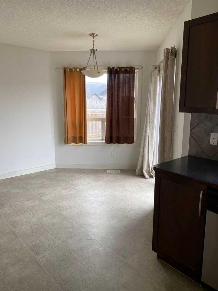 Property Photo: 210 Saddlebrook Way NE AB T3J 0B5