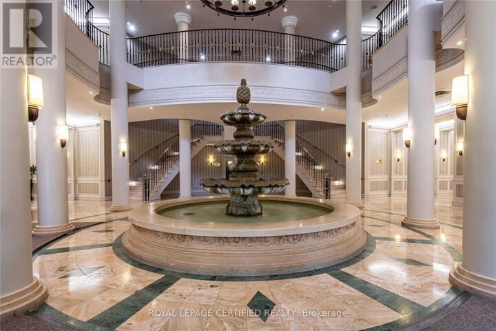 Property Photo: 35 Kingsbridge Garden Circle 1208 ON L5R 3Z5