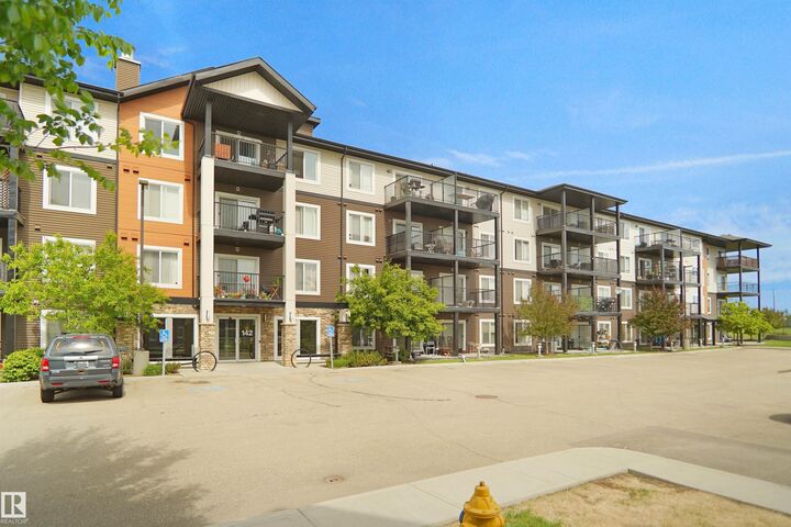 Property Photo: 142 Ebbers Boulevard NW 202 AB T5Y 3W2