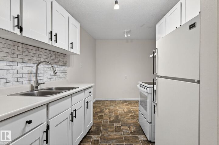 Property Photo:  10335 117 Street NW 305  AB T5X 1X9 