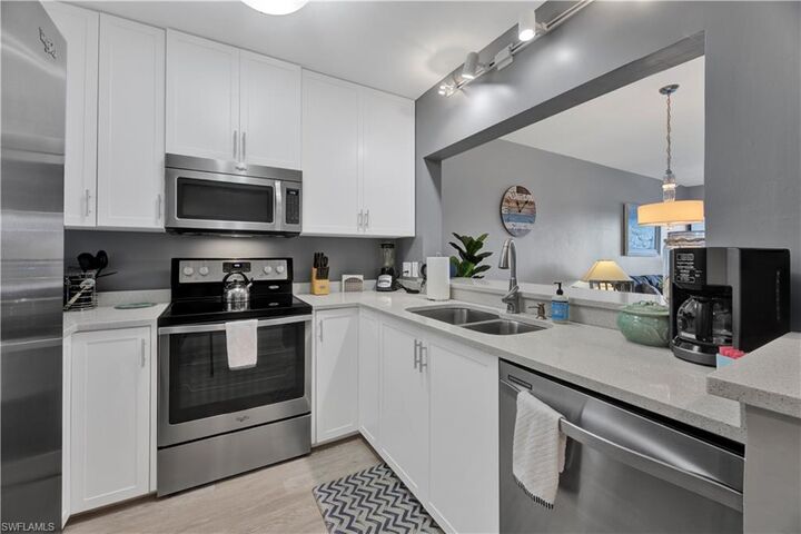 Property Photo: 803 River Point Dr 107B FL 34102