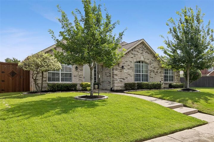 Property Photo:  1516 Brewster Drive  TX 75010 