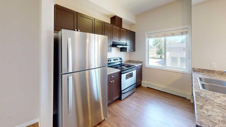 Property Photo: 10004 97A Street 306 AB T8V 2C1
