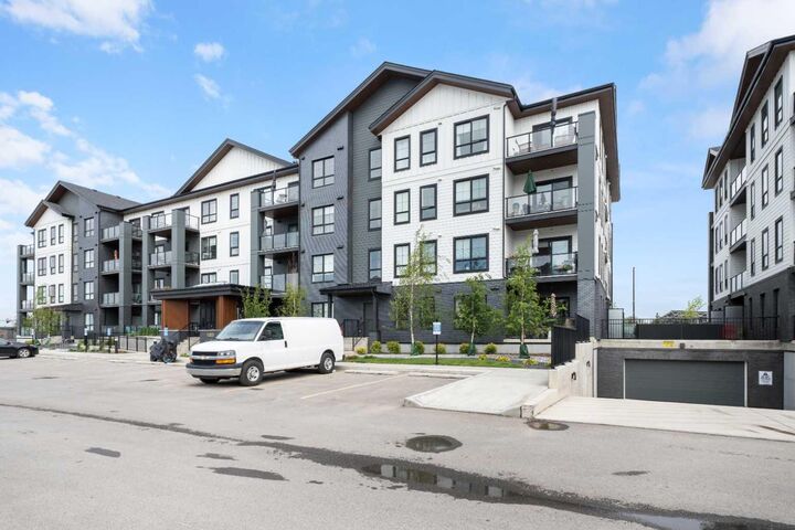 Property Photo: 100 Banister Drive 1102 AB T1S 5Y2