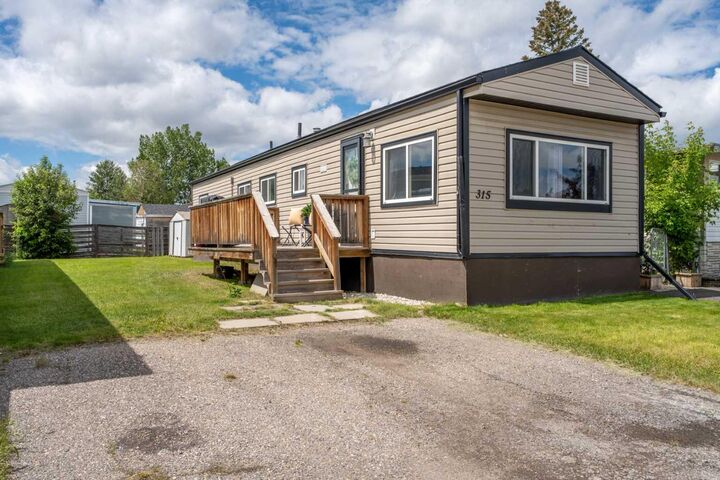 Property Photo: 6220 17 Avenue SE 315 AB T2A 0W6