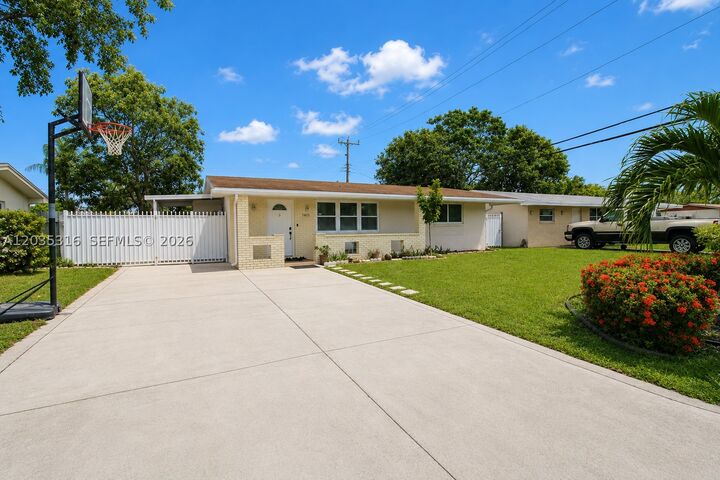 Property Photo:  7611 NW 15th Ct  FL 33024 