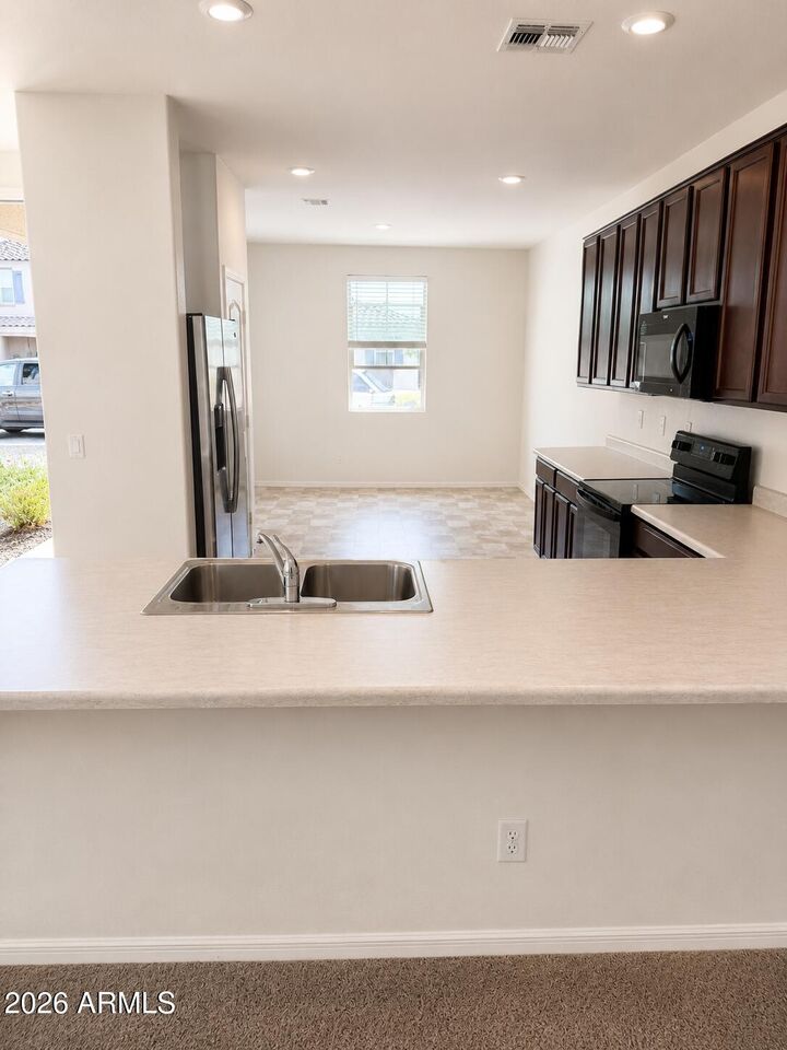 Property Photo:  12552 W Midway Avenue  AZ 85307 
