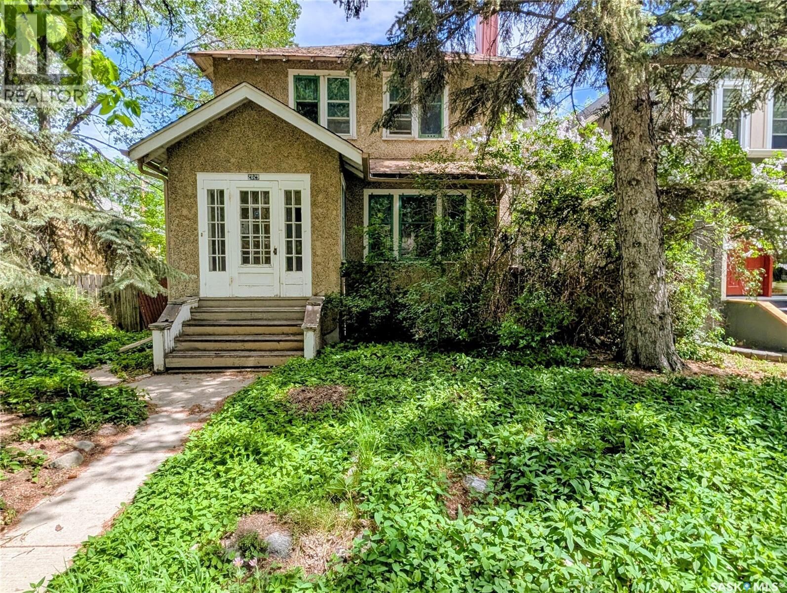 Property Photo:  2029 Elphinstone Street  SK S4T 3N5 