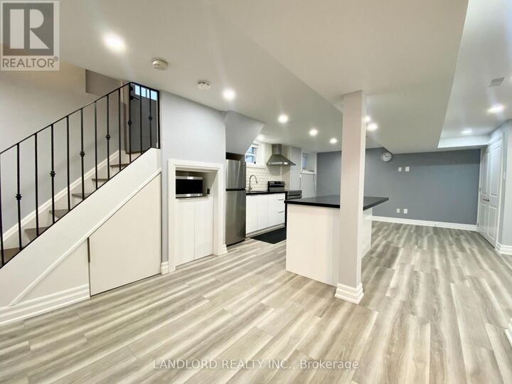Property Photo: 1001 Cosburn Avenue Bsmt ON M4C 2W8
