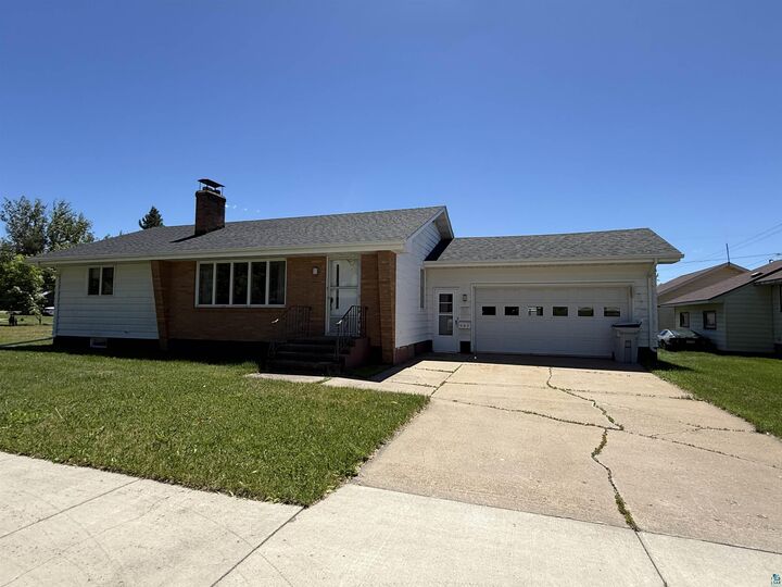 Property Photo:  607 3rd St NE  MN 55719 