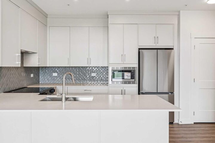 Property Photo: 3700 Seton Avenue SE 3303 AB T3M 4K4
