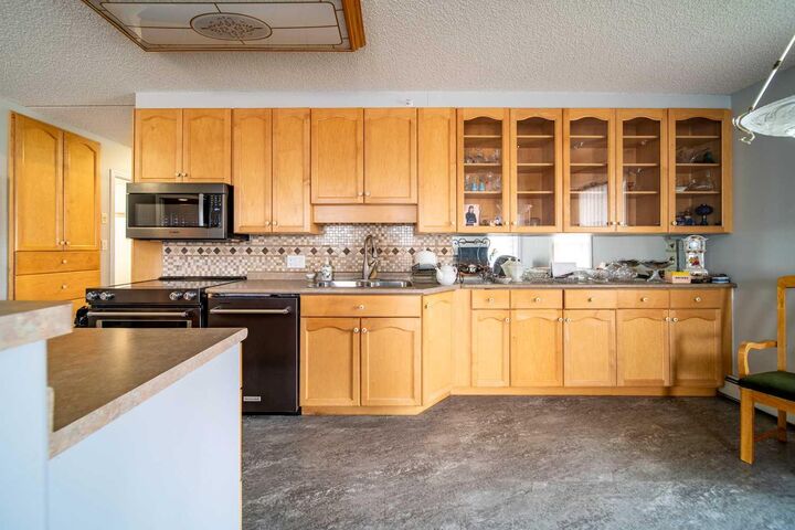 Property Photo:  848 4 Avenue 201  AB T9W 1V6 