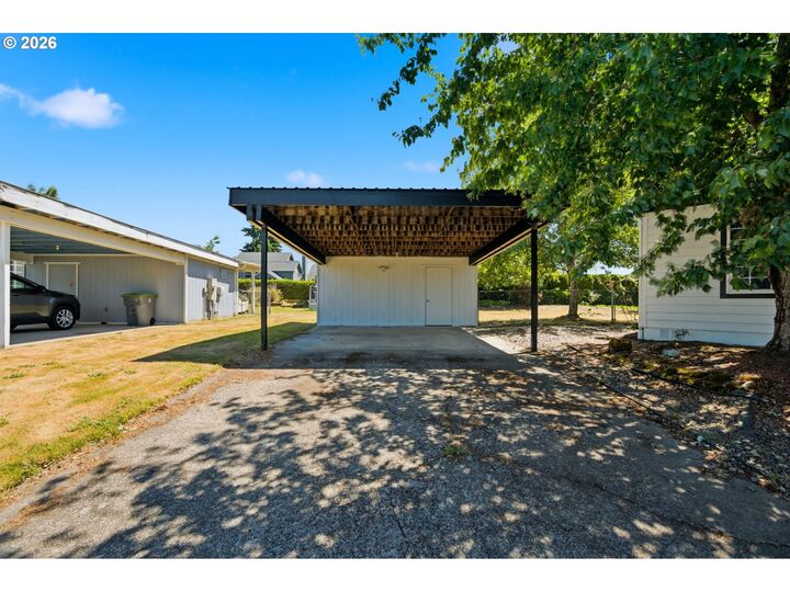 Property Photo:  655 NE Burnett Rd 4  OR 97128 