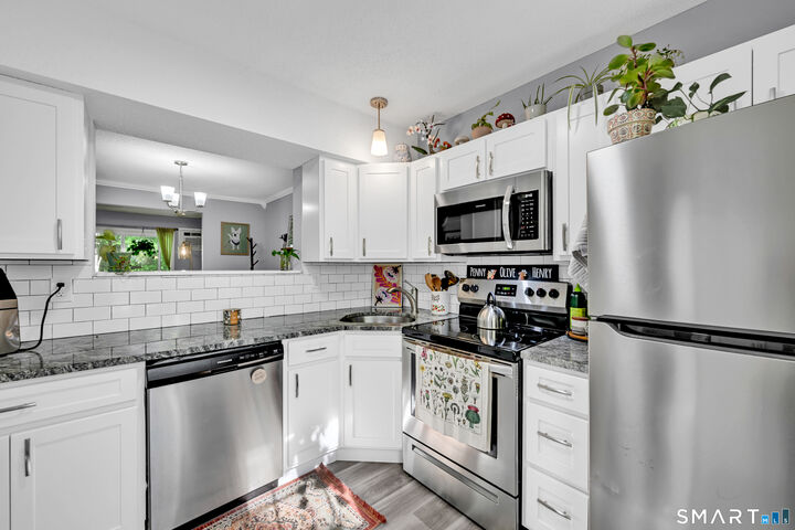 Property Photo:  745 Merrow Road 111  CT 06238 