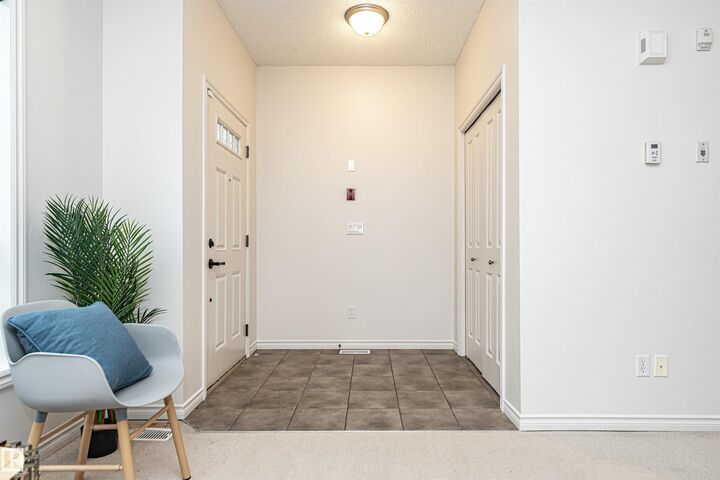 Property Photo: 13825 155 Avenue NW 103 AB T6V 0B8