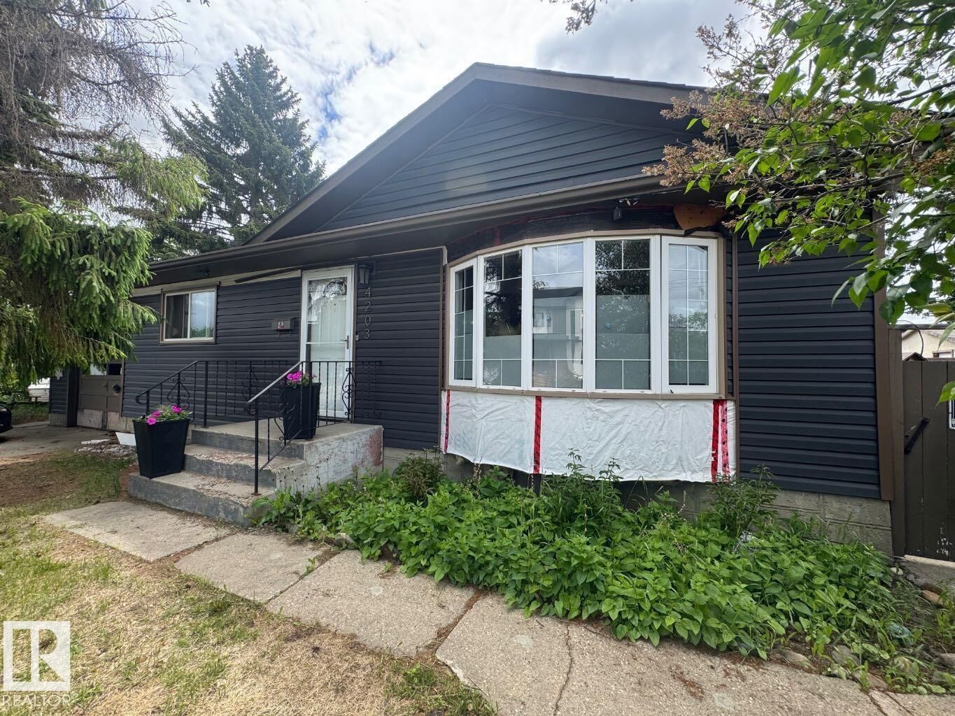 Property Photo:  4203 106 Avenue NW  AB T6A 2E1 