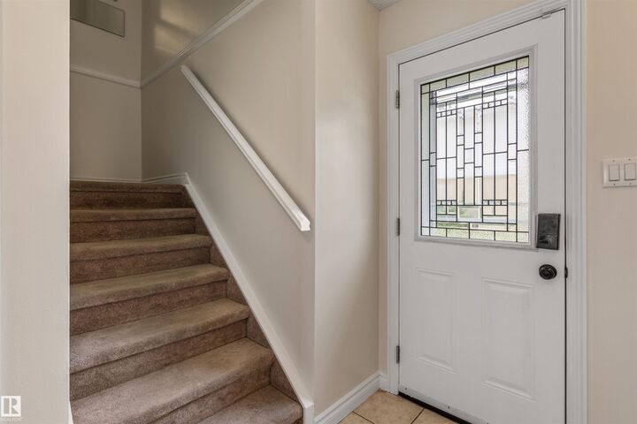 Property Photo: 9310 Morinville Drive 13 AB T8R 1J8