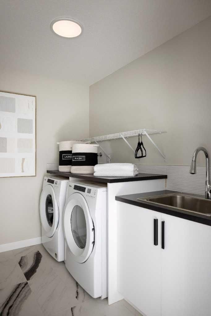 Property Photo: 109 Belmont Path SW AB T2X 6E5
