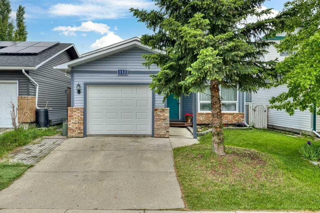 Property Photo: 112 Cedargrove Way SW AB T2W 4V2