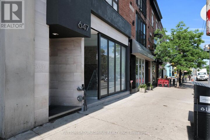 Property Photo: 647 College Street ON M6G 1B7