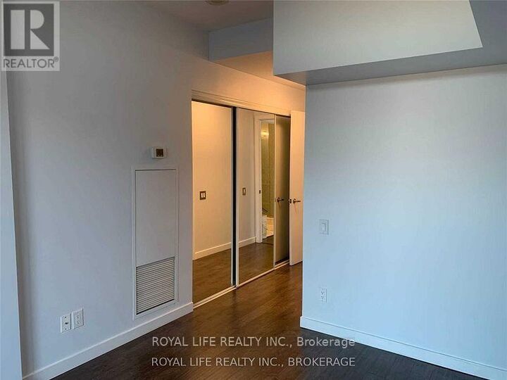 Property Photo: 103 The Queensway 1204 ON M6S 5B3