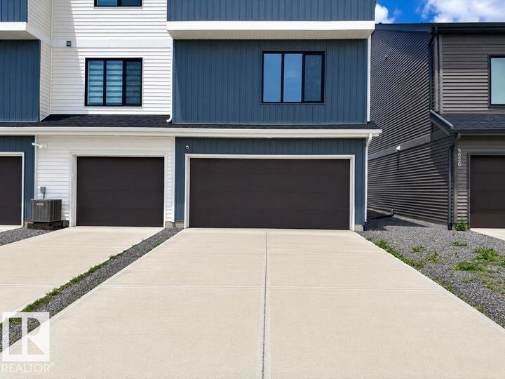 Property Photo: 5034 Rivers Edge Way NW AB T6M 1P9