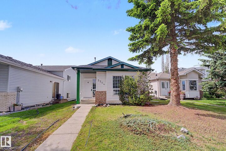 Property Photo:  3704 39 Avenue NW  AB T6L 6S9 