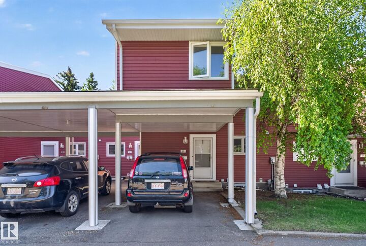 Property Photo:  1904 48 Street NW 10  AB T6L 5H3 