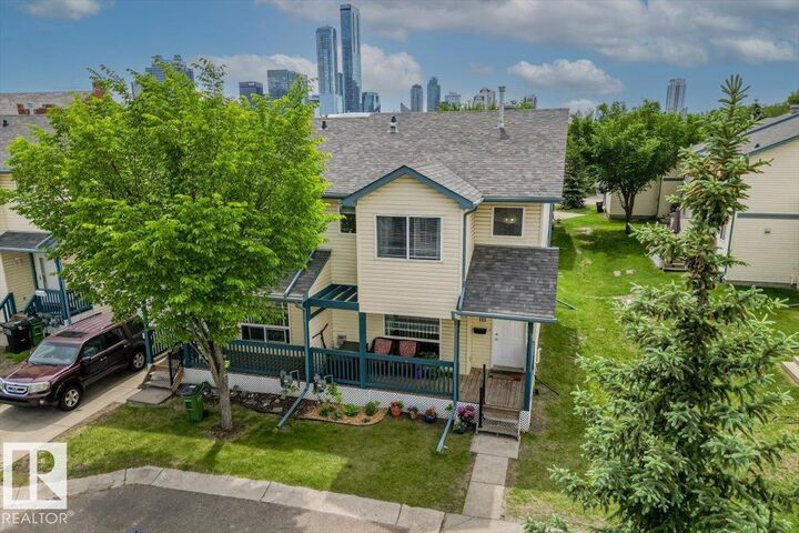 Property Photo:  10909 106 Street NW 111  AB T5H 4M7 