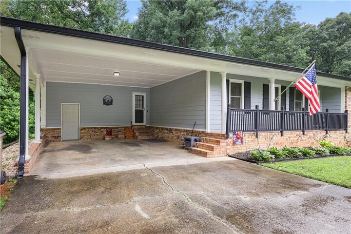 Property Photo:  5041 Fitts Drive NE  GA 30075 
