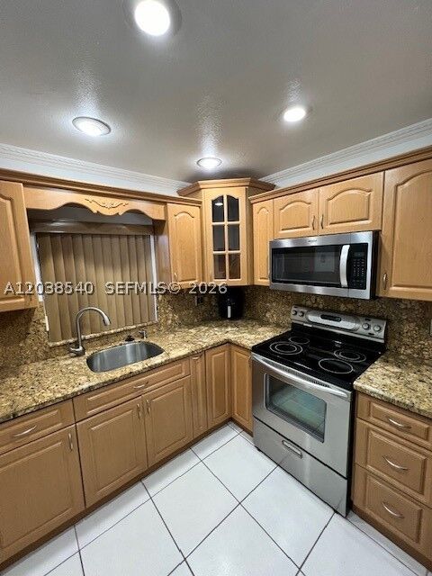 Property Photo:  2540 W 67th Pl 204-28  FL 33016 