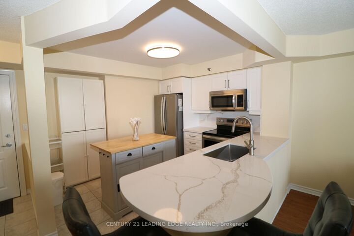 4640 Kimbermount Avenue 305 — photo 1