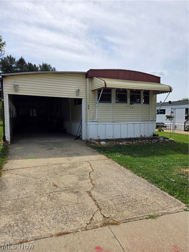 Property Photo: 99 Thomas Boulevard NW OH 44647