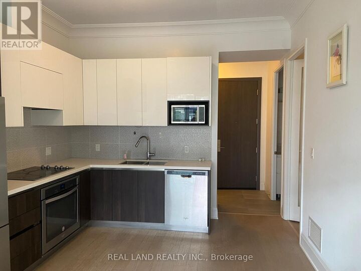 Property Photo: 25 Water Walk Drive 203 ON L6G 0G3