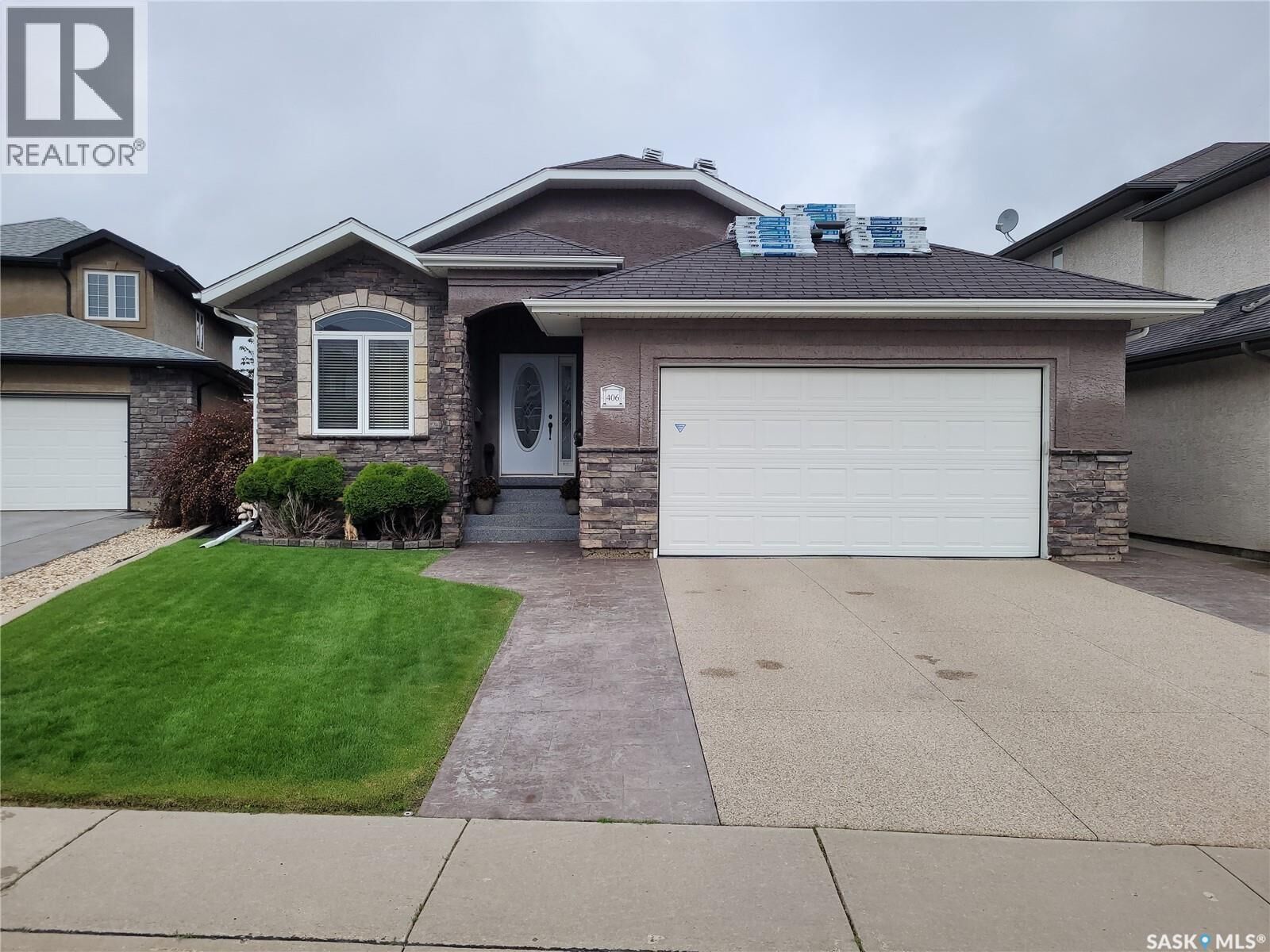 Property Photo:  406 Bolton Place  SK S7T 0A2 