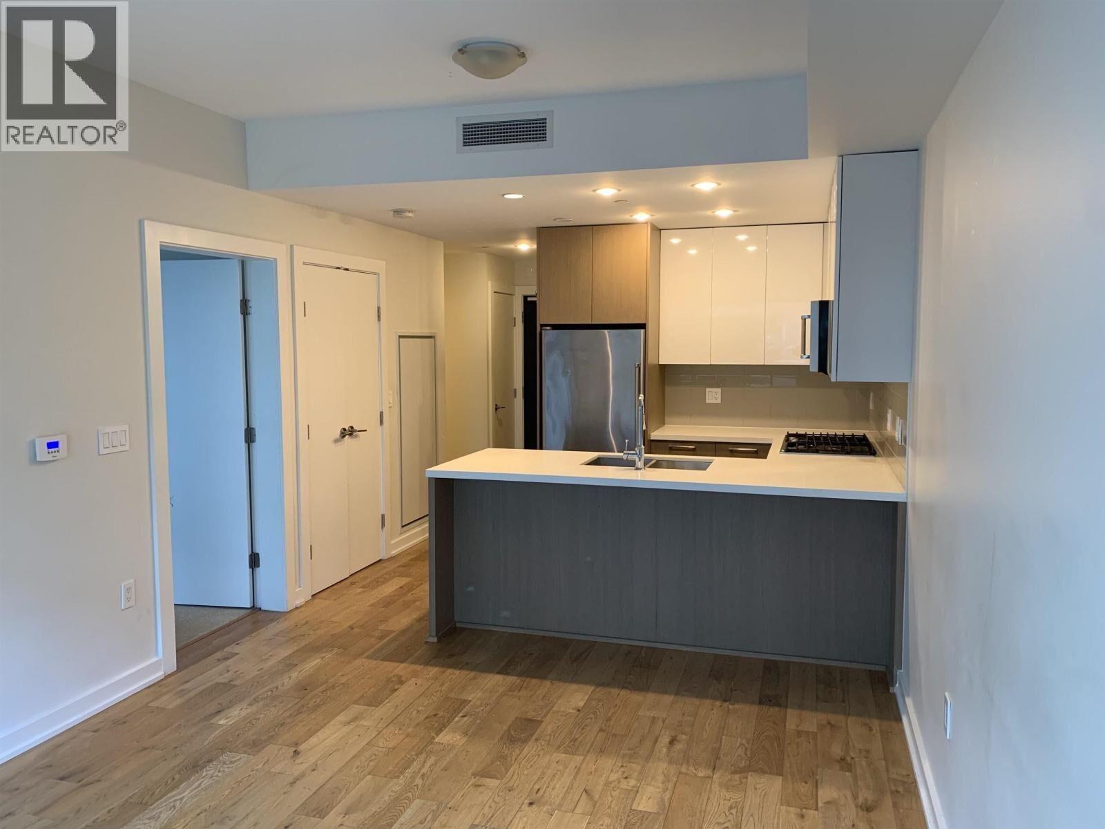 Property Photo:  5311 Alderbridge Way 2xx  BC V6X 0M3 
