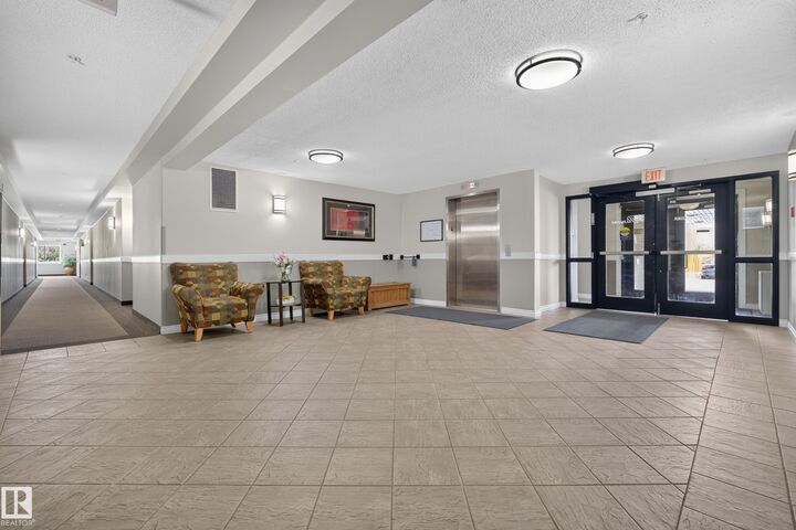 Property Photo:  6 Spruce Ridge Drive 204A  AB T7X 4M5 