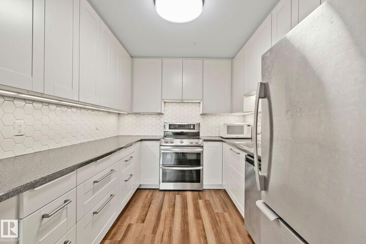 Property Photo: 9940 112 Street NW 705 AB T5K 1L8