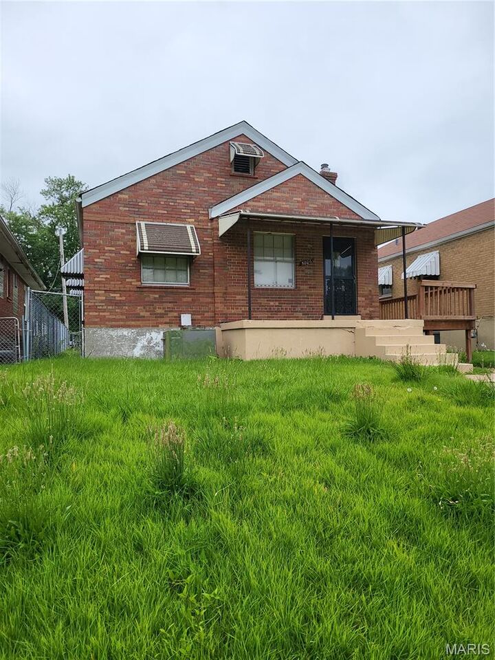 Property Photo: 5806 Woodland Avenue MO 63120