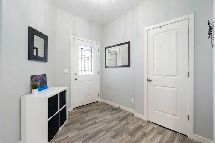 Property Photo: 642 Kingsmere Way SE AB T4A 0X7