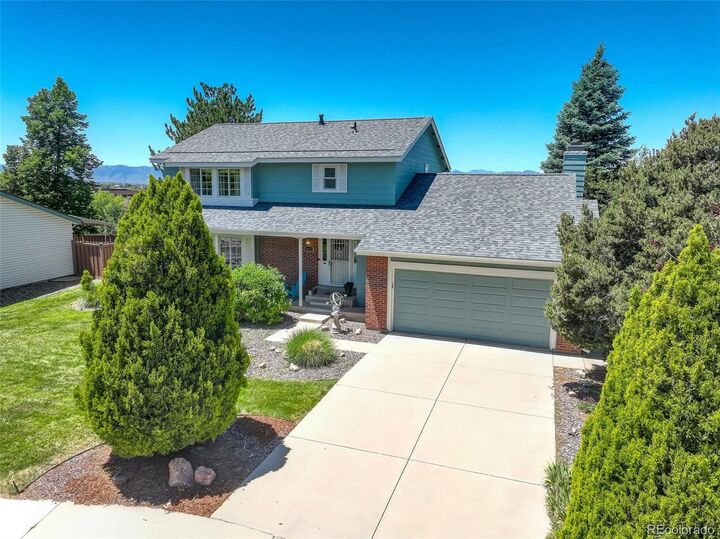Property Photo:  8411 Timberwood Street  CO 80126 