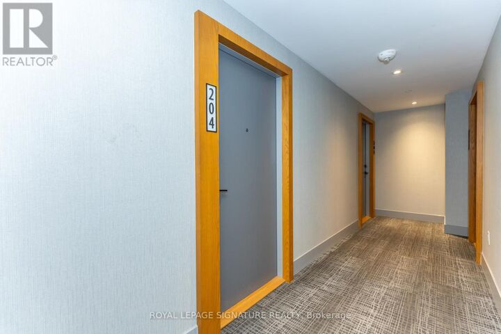 Property Photo: 1888 Queen Street East 204 ON M4L 1H4