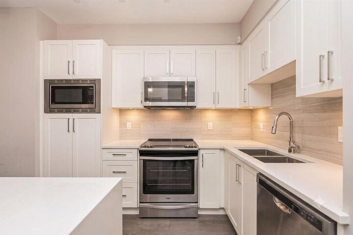 Property Photo:  20211 66 Avenue E102  BC V2Y 0L4 